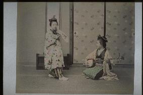 A girl dancing to the shamisen