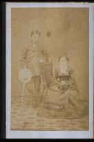 A man and a woman in Western attire (Japanese)