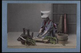 A woman preparing for a meal