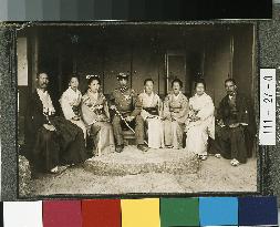 Photo of Soldier’s Family (8 People sitting at the veranda)