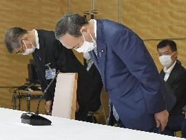 Japan PM Suga apologizes over workers' asbestos diseases