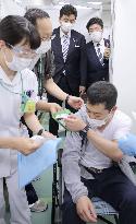 Rehearsal for mass vaccinations in Tokyo