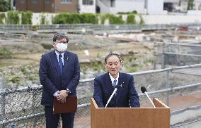 Japan PM Suga visits railway ruins in Tokyo