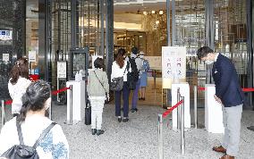 Virus-linked commercial restrictions ease in Tokyo