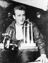 JAMES DEAN WITH HIS MOTORING TROPHIES  PICTURE FROM THE RONA