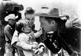 KIRK DOUGLAS WITH HIS WIFE ANNE BUYDENS AND SON ERIC OR PETE