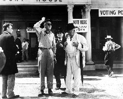 JOHN FORD, DIRECTOR WITH CHARLES WINNINGER, ACTOR ON THE SET