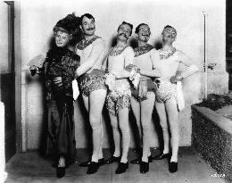 WILLIAM HAINES (SECOND FROM THE LEFT) AND HIS ACROBATIC TROU