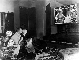 WALLACE, RITA AND CAROL ANN BEERY WATCHING HOME MOVIES PICTU