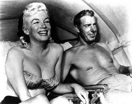 MARILYN MONROE with her second husband, Joe DiMaggio, 1954
