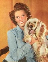 MAUREEN O'HARA WITH DOG PICTURE FROM THE RONALD GRANT ARCHIV