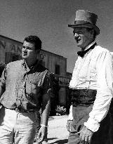 Michael and John Wayne on the set of The Alamo in 1960. Mich