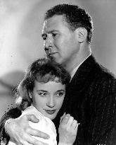 WOMAN IN A DRESSING GOWN