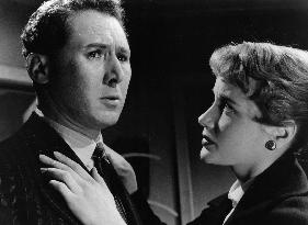 WOMAN IN A DRESSING GOWN