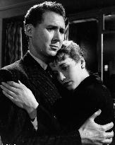 WOMAN IN A DRESSING GOWN