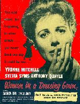 WOMAN IN A DRESSING GOWN