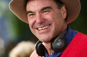 Director OLIVER STONE on the set of the action adventure dra