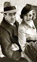 Director William Wyler and actress Margaret Sullavan on hone