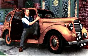 Actor JIMMY HANLEY with his HILLMAN Minx, 10 horsepower salo