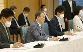 Japan PM Suga at meeting on non-regular employees