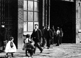 A frame enlargement from a film of workers leaving the Brigh