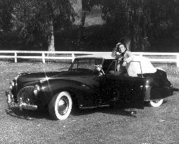 EDWARD ALBERT JR WITH A LINCOLN CONTINENTAL