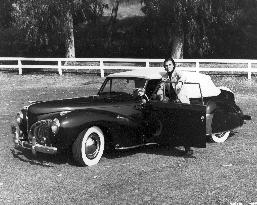 EDWARD ALBERT JR WITH A LINCOLN CONTINENTAL