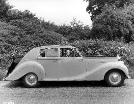 RICHARD TODD WITH HIS BENTLEY CALLED 'BELINDA BLUE EYES'