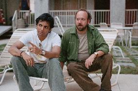 Pictured: M. NIGHT SHYAMALAN and PAUL GIAMATTI in Warner Bro