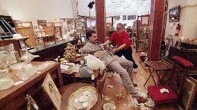 B-53 Borat wreaks havoc in an American antique shop. BORAT: