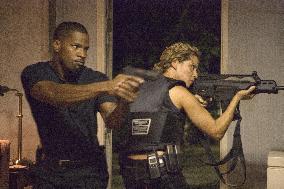JAMIE FOXX as Detective Ricardo Tubbs and ELIZABETH RODRIGUE