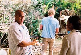 Pictured: Donald Faison (left), Simon Baker (center) and San