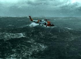 A scene from THE GUARDIAN. A famed Coast Guard Rescue swimme