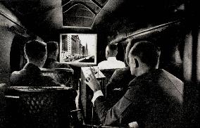 THE FIRST FILM PROJECTED IN AN AIRCRAFT while an eleven seat