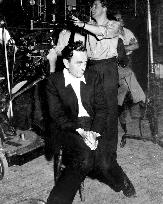 Director DAVID LEAN looks very serious on the set of HOBSON'