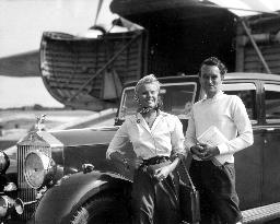 Film director DAVID LEAN and his wife actress ANN TODD retur