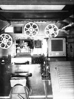 MOBILE CINEMA VAN interior showing Bell and Howell 601 Model