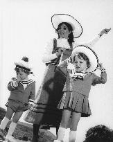 JOAN COLLINS with her children ALEXANDER and TARA NEWLEY on