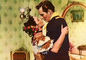 THE MAN BEHIND THE GUN