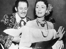 THE MAN BEHIND THE GUN