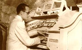 ORGANIST HORACE FINCH at the keyboard of the WURLITZER ORGAN