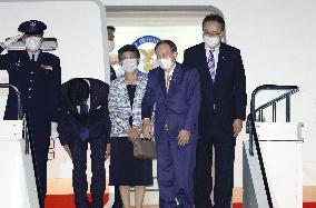 Japan PM Suga departs for G-7 summit in Britain