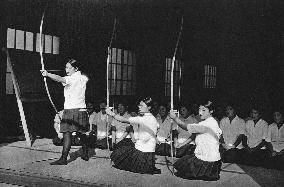 Three Japanese archery students