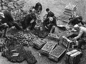 Communist China - sorting weapons and ammunition