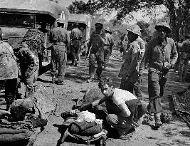 Indian medical orderlies assisting with wounded