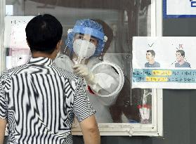 S. Korea logs record 1,275 daily coronavirus cases
