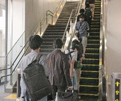 Japanese expats return from Indonesia on chartered plane