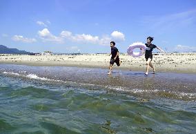 Tsunami-hit northeastern Japan beach reopens