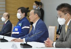 Japan PM Suga at meeting on heavy rain
