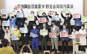 Japan opposition demands extra parliament session on COVID-19 response